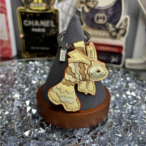 Coach Accessories - Coach RARE vintage metallic gold koi fish keychain NWOT